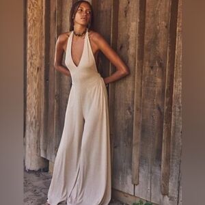 Blue free people jumpsuit size Mediun